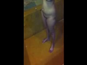 a thick indian girl being filmed bathing