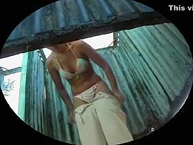 Bikini lass filmed changing into street clothes