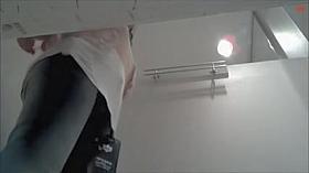 Brunette in fitting room is showing her booty cheeks