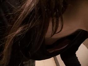 Asian woman down blouse shows small and perky boobs