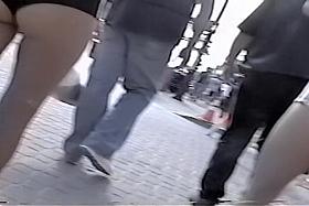 Big butted girl in tiny shorts teasing with cameltoe