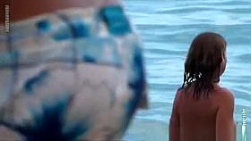 Young woman playing in the sea