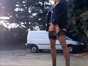 Exhibitionist chick flashing her shaved pussy