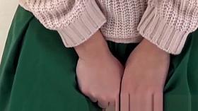 Asian cutie lifts her skirt up to show how she pees