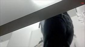 Fem in dark tight jeans recorded back to the spy camera