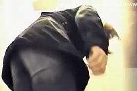 Women get filmed pissing in the restroom