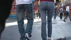 Hot ass in tight jeans swaying in front of a candid cam