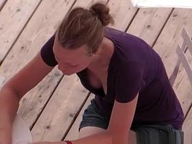 Down blouse on girl wearing purple t-shirt