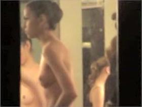 Cute ballet dancers voyeured half nude through the window