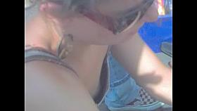 Girl in sunglasses does not notice her downblouse spied