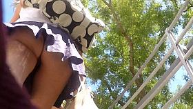 Nice ass upskirted on the stairs