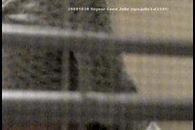 Brunette bared off her big tits in the window