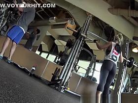 Women in black yoga pants exercising