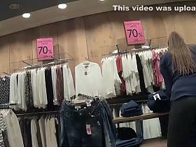 Sexy store clerk in tight leggings