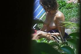 Topless on voyeur cam