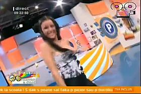 Raven-haired bombshell's jugs bust out of her shirt as she is dancing