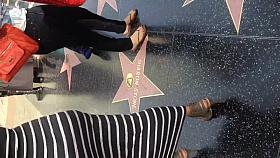 Fat ass Columbian in gray dress