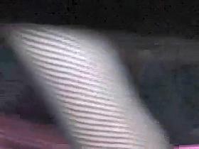 Pretty dark pussy exposed under a skirt