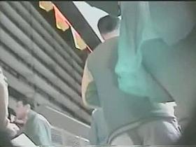 Nighttime upskirt video of a hot bare ass taking a stroll