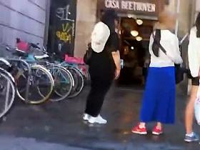 Two girls with shorts in their butt cracks