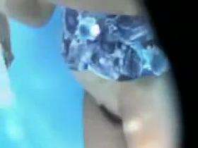 Beach cabin girl got tits and bush on pussy voyeured