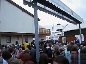 Fest girl makes water into a mug and takes a sip