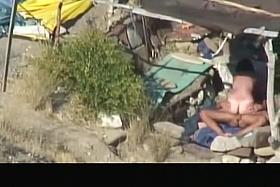 Nude couple banging in the beach