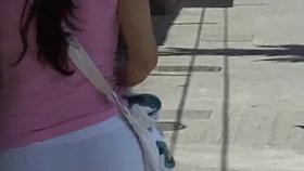 Perfect round ass in tight white pants