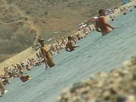 Sexy naked people in a beach spy voyeur video