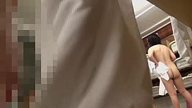 Asian girl in changing room shows her thick hairy cunt pk01