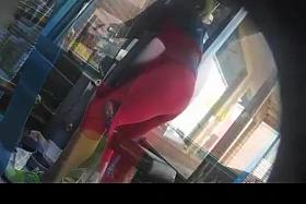 Sporty girl in red spandex pants