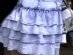 Brunette upskirted in local street fair