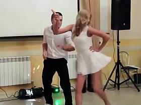 Peeking up her skirt during a dance