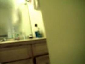 Doll waving her soft booty on hidden shower camera