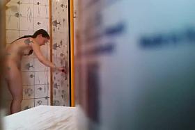 Petite girl peeped naked in bathroom