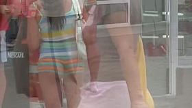 Hot Brunette shows off butt cheek in sexy booty shorts video