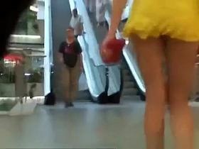 Hot long hair blonde upskirted in the shopping