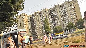 Upskirt caught brunette teen wearing cute thong