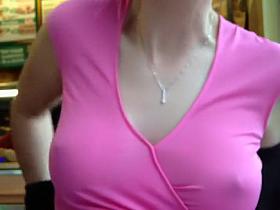 Delicate nipples poking out of a blouse