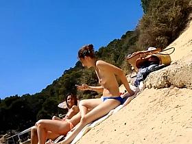 Peeking on some charming topless girls