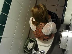 Juicy ass and tight pussy spied in toilet