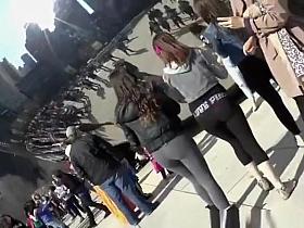 Teens in black leggings taking pictures