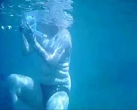 Topless thick MILF under the water for voyeurs