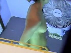 Pretty bimbo in nothing but tiny thong on changing room cam