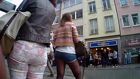 Girl in tight shorts waits metro