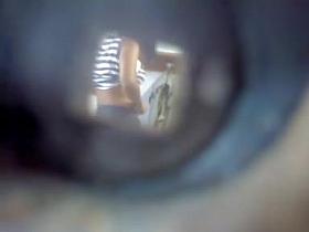 Amateur cuties in change room spied through key hole
