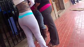 Cute young lady gets her seductive butt taped from behind