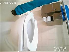 Amateur girl takes a plop in a public lavatory