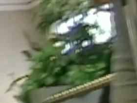 Brunette with a juicy ass in jeans followed by a candid cam voyeur