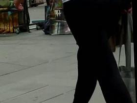 A sweet ass girl in tight pants gets followed by a voyeur